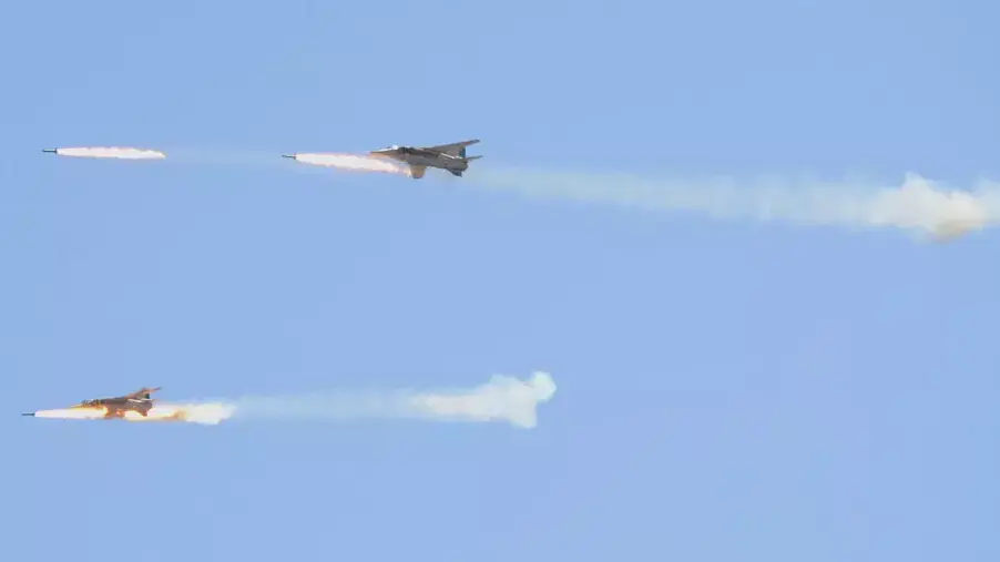 מטוסי חיל האוויר של סוריה מתרגלים הפצצה במיקום לא ידוע, בתמונה שפרסמה סוכנות הידיעות הסורית הממלכתית, 11 ביולי 2012 מטוסי חיל האוויר של סוריה מתרגלים הפצצה במיקום לא ידוע, בתמונה שפרסמה סוכנות הידיעות הסורית הממלכתית, 11 ביולי 2012