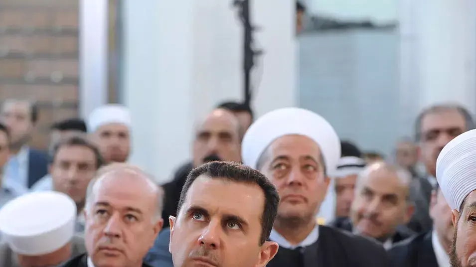 נשיא סוריה, בשאר אסד, בתפילה בדמשק לרגל סיום חודש רמדאן. 19 באוגוסט 2012