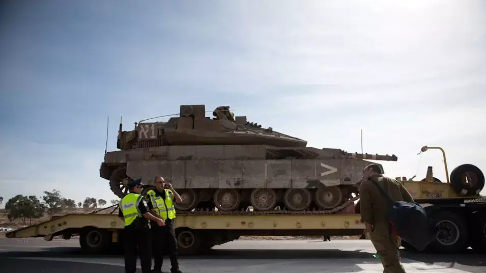 חיילי מילואים וכלי שריון של צה"ל נעים לעבר רצועת עזה במסגרת מבצע "עמוד ענן". 16 בנובמבר 2012 חיילי מילואים וכלי שריון של צה"ל נעים לעבר רצועת עזה במסגרת מבצע "עמוד ענן". 16 בנובמבר 2012
