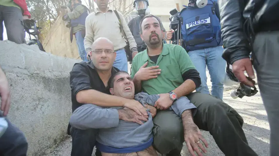 הפגנת פלסטינים בביתוניא, פברואר 2013 הפגנת פלסטינים בביתוניא, פברואר 2013