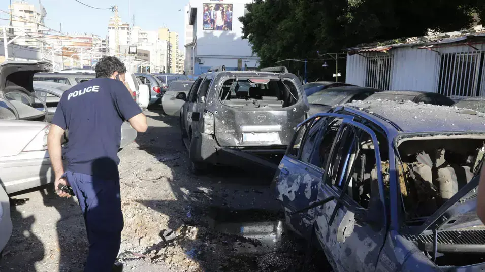 נפגעים ברובע הדאחייה בביירות לאחר ירי שתי רקטות גראד, מאי 2013 נפגעים ברובע הדאחייה בביירות לאחר ירי שתי רקטות גראד, מאי 2013