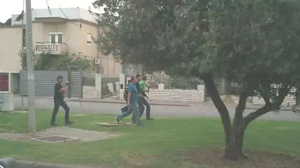 רועי אוחנה בשחזור הרצח בקריית אתא, מאי 2013