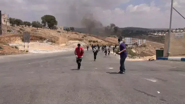 תיעוד: דוברת "בצלם" צילמה את רגע הירי לעברה תיעוד: דוברת "בצלם" צילמה את רגע הירי לעברה