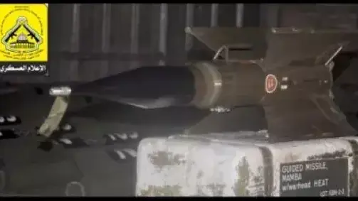 ביום בו נפתח המו"מ, תצוגת תכלית  של כלי נשק ואמצעי לחימה  באתר  גדודי אל-אקצא של הפת"ח, יולי 2013