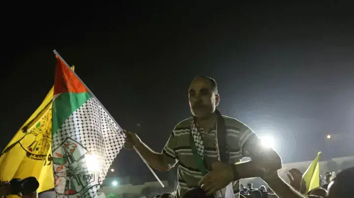 אסירים פלסטינים מגיעים לרמאללה, אוגוסט 2013
