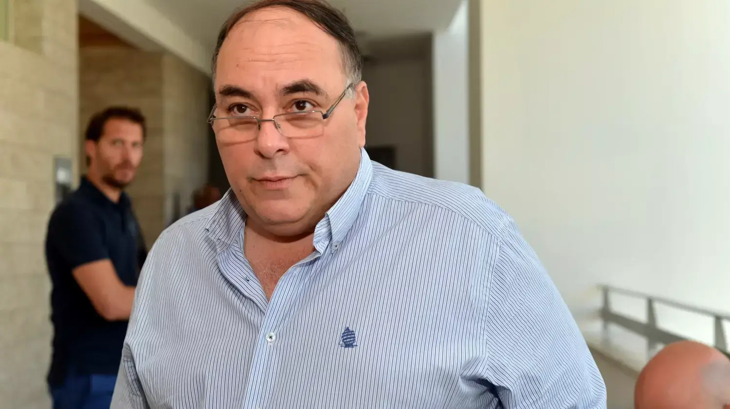 אבי בניהו בדיון בנושא תביעת הדיבה נגד מקאן אריקסון.בית המשפט המחוזי, לוד. אבי בניהו בדיון בנושא תביעת הדיבה נגד מקאן אריקסון.בית המשפט המחוזי, לוד.