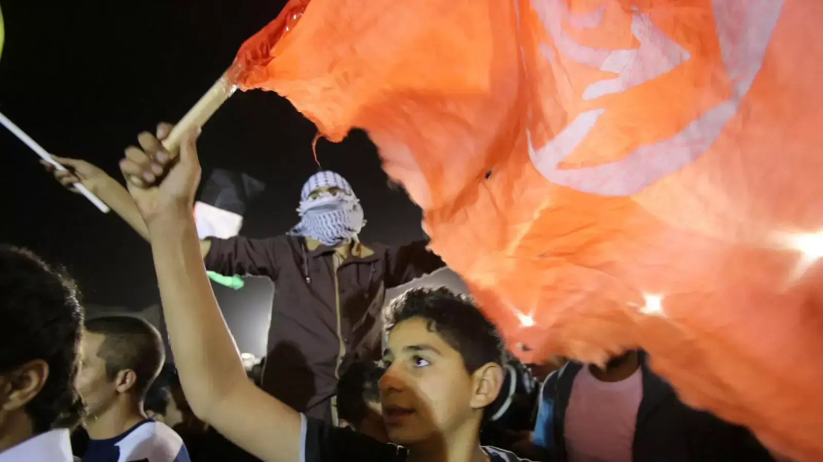 משפחות אסירים ממתינות לשחרורם במוקטעה ברמאללה. 30 באוקטובר 2013 משפחות אסירים ממתינות לשחרורם במוקטעה ברמאללה. 30 באוקטובר 2013