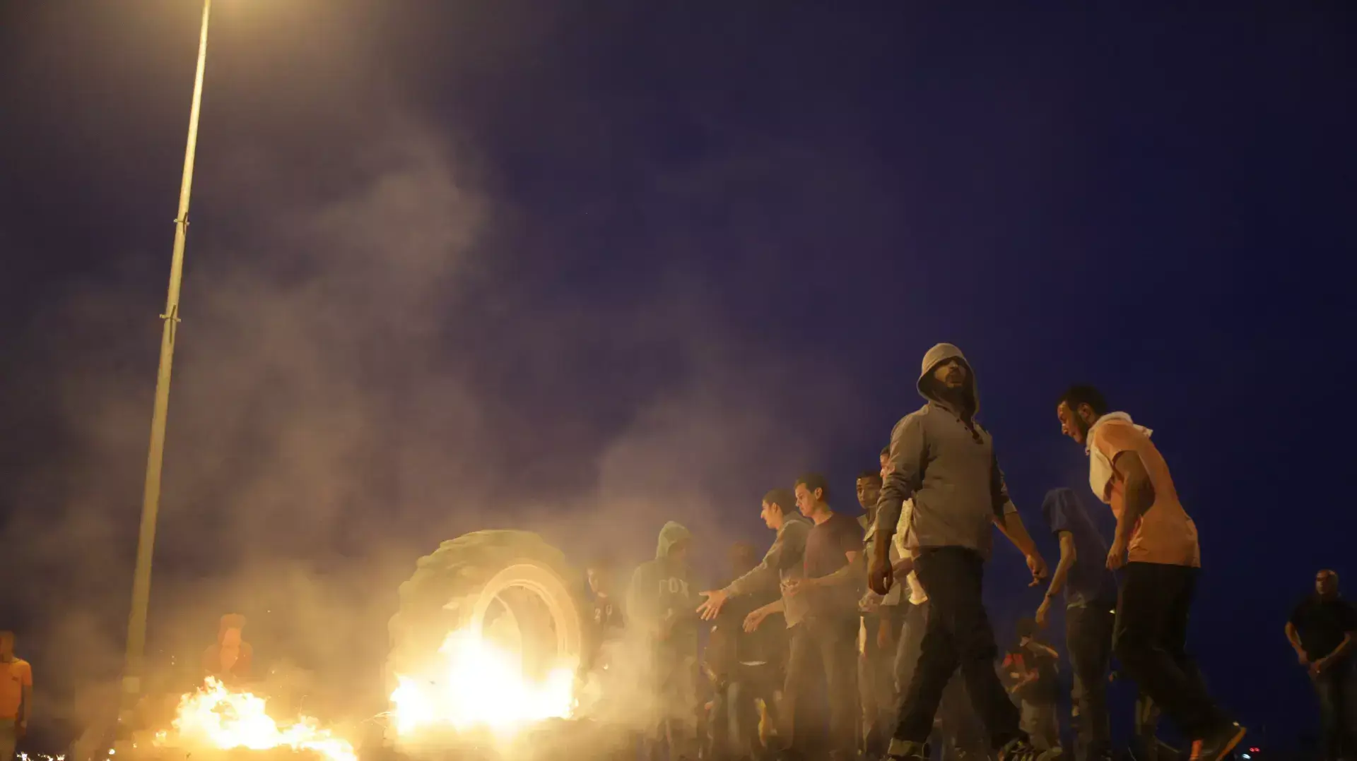 מפגינים נגד תכנית פראוור בצומת חורה בנגב מפגינים נגד תכנית פראוור בצומת חורה בנגב