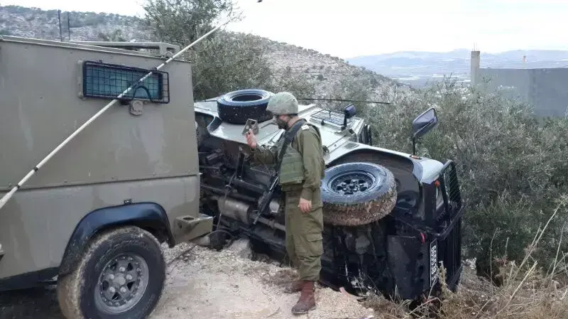 רכב צה"לי רביעי שהתהפך בשבוע האחרון בקבטיה במהלך מבצע מעצרים. דצמבר 2013