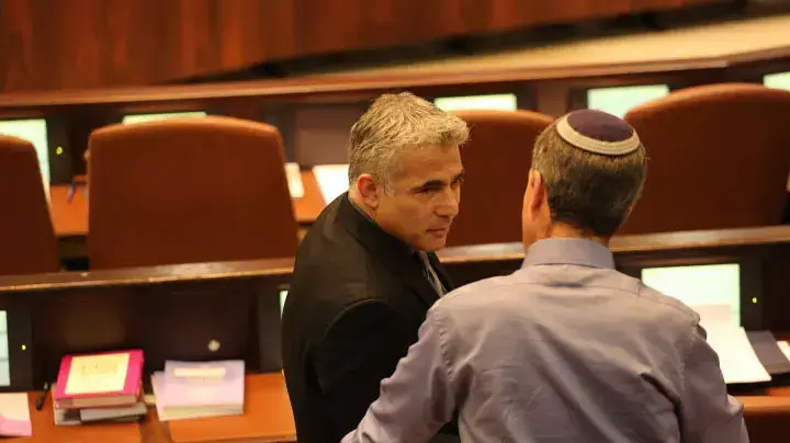שר האוצר יאיר לפיד במליאת הכנסת. מרץ 2014 שר האוצר יאיר לפיד במליאת הכנסת. מרץ 2014