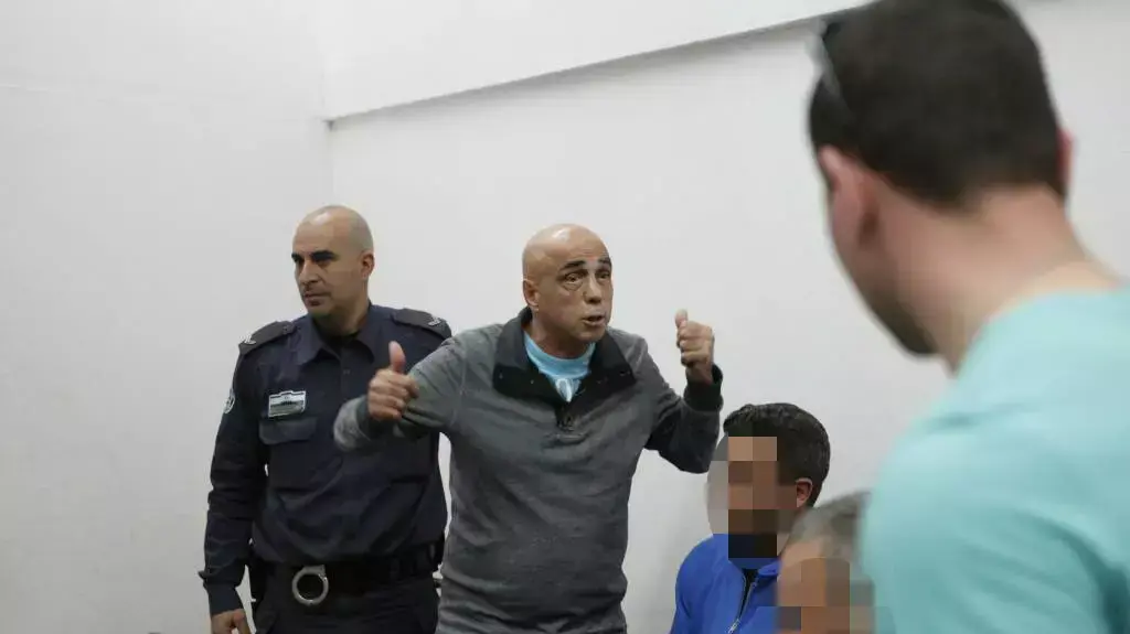 איתן חייא מובא להארכת מעצר בפרשת סחיטה, ביהמ"ש השלום תל אביב. מרץ 2014