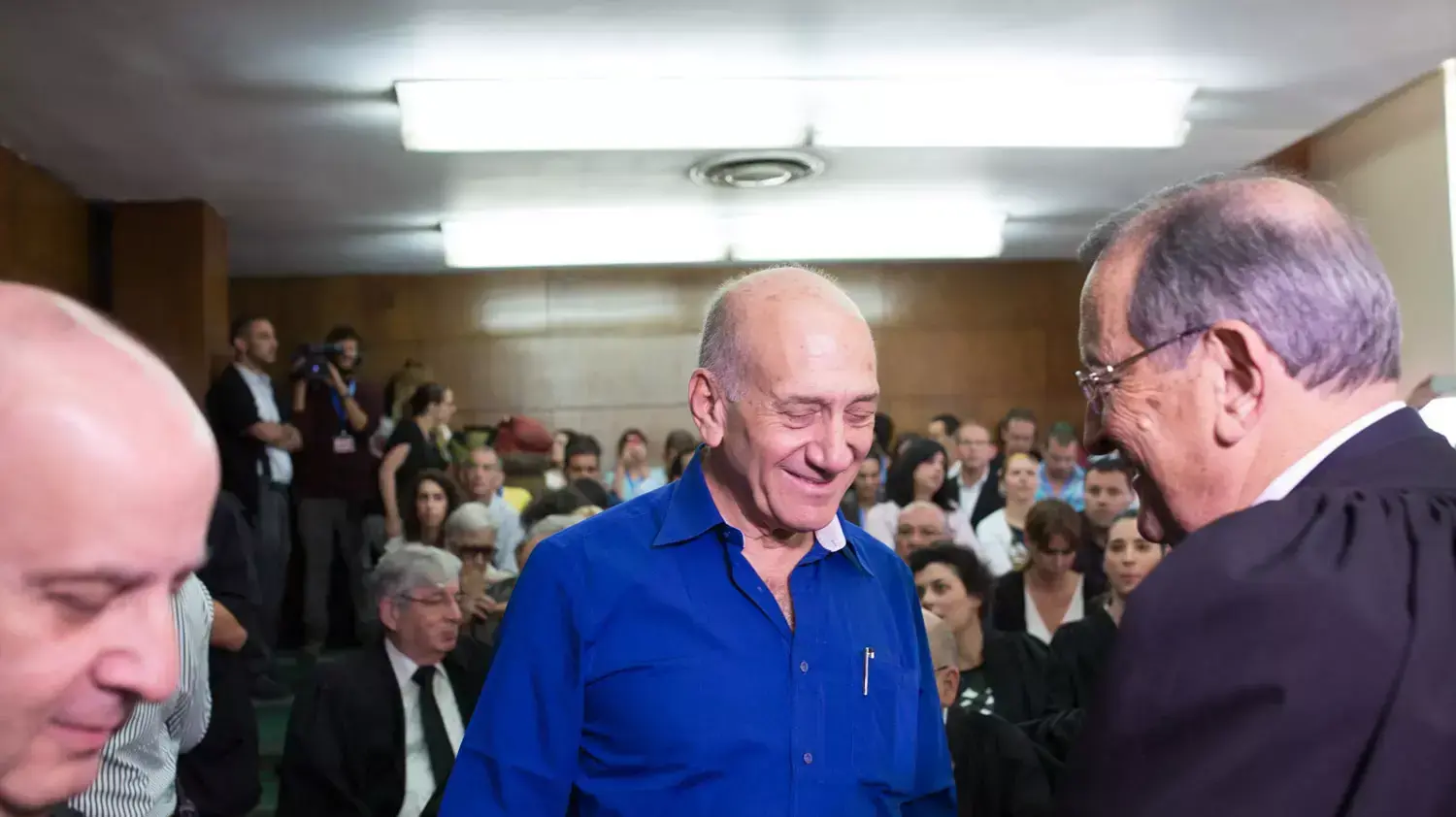 ראש הממשלה לשעבר אהוד אולמרט בבית המשפט, מאי 2014 ראש הממשלה לשעבר אהוד אולמרט בבית המשפט, מאי 2014