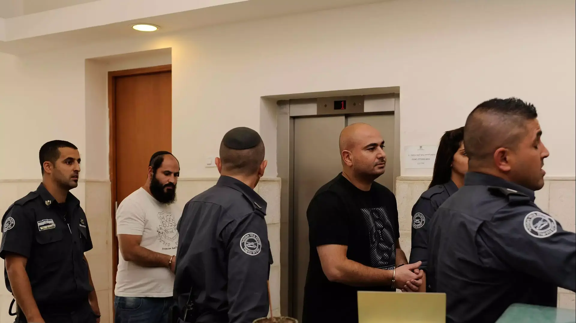 האחים אילוז בבית משפט המחוזי בירושלים. מאי 2014