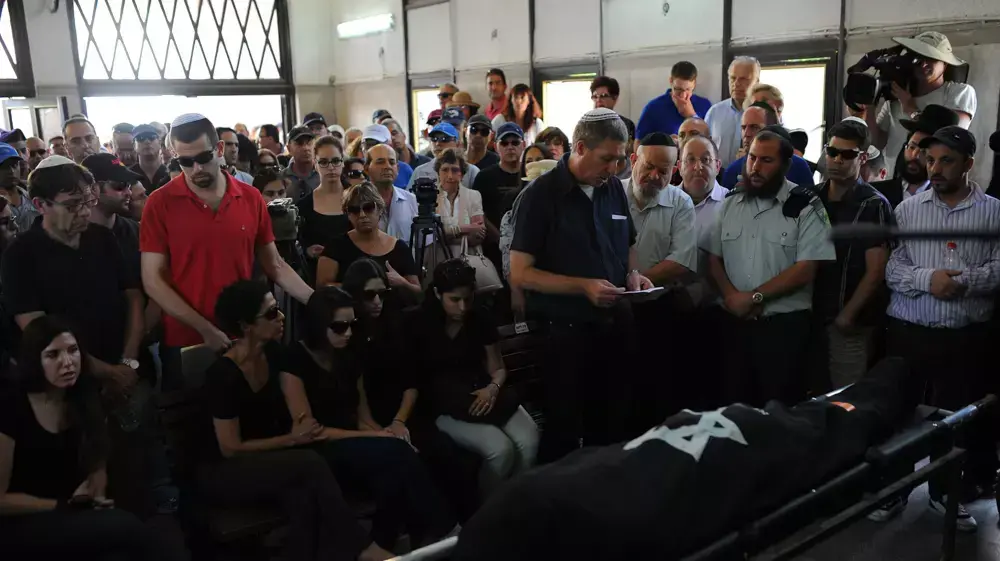 הלוויתם של הזוג עמנואל ומירה ריוה בבית העלמין בקרית שאול. מאי 2014 הלוויתם של הזוג עמנואל ומירה ריוה בבית העלמין בקרית שאול. מאי 2014