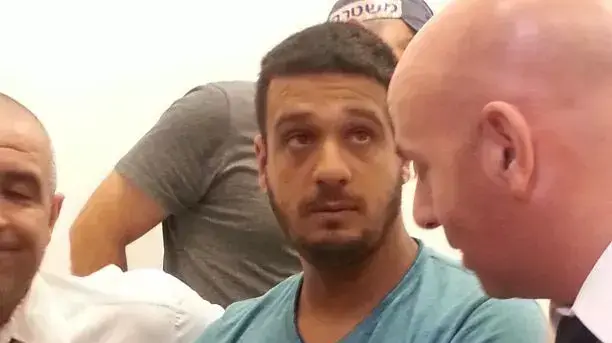 בילאל שאכר, החשוד ברצח רינת רואס, בבית משפט השלום באשקלון, יוני 2014 בילאל שאכר, החשוד ברצח רינת רואס, בבית משפט השלום באשקלון, יוני 2014