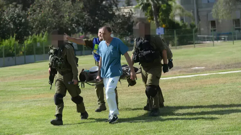 פצועים מגיעים לבית החולים סורוקה, יולי 2014 פצועים מגיעים לבית החולים סורוקה, יולי 2014