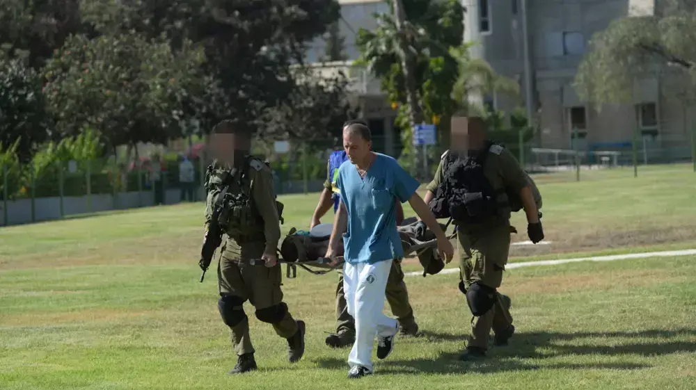 פצועים מגיעים לבית החולים סורוקה, יולי 2014 פצועים מגיעים לבית החולים סורוקה, יולי 2014