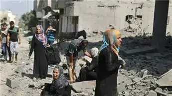 ההריסות שנראו בשג'אעיה במהלך הפסקת האש במבצע צוק איתן, יולי 2014 ההריסות שנראו בשג'אעיה במהלך הפסקת האש במבצע צוק איתן, יולי 2014