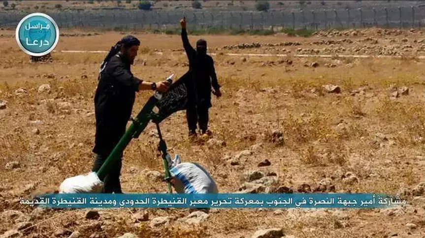 חמושים מארגון ג'בהת אל נוסרה שהשתלטו על האזור ליד הגבול עם ישראל, אוגוסט 2014 חמושים מארגון ג'בהת אל נוסרה שהשתלטו על האזור ליד הגבול עם ישראל, אוגוסט 2014