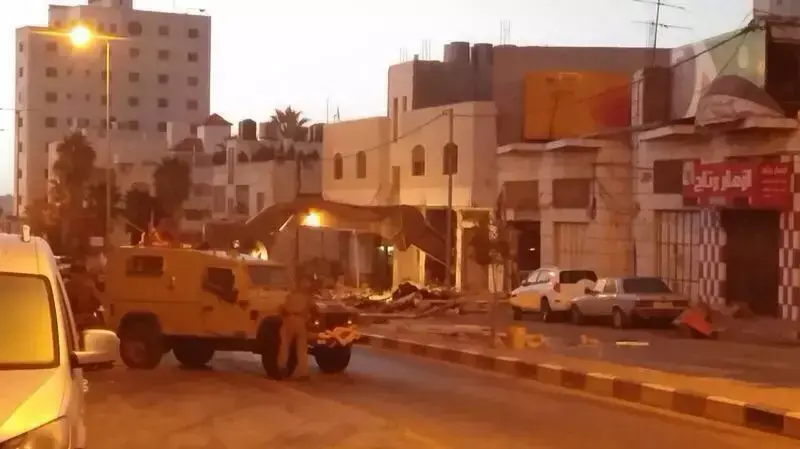 הבית בו הסתתרו רוצחי הנערים בחברון, שם חוסלו ב-23.9.14 הבית בו הסתתרו רוצחי הנערים בחברון, שם חוסלו ב-23.9.14