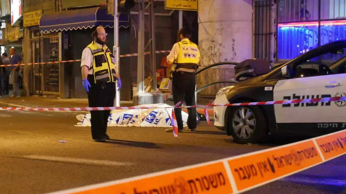 תמונות מזירת הרצח ברחוב המגינים בחיפה 22.10.2014 תמונות מזירת הרצח ברחוב המגינים בחיפה 22.10.2014