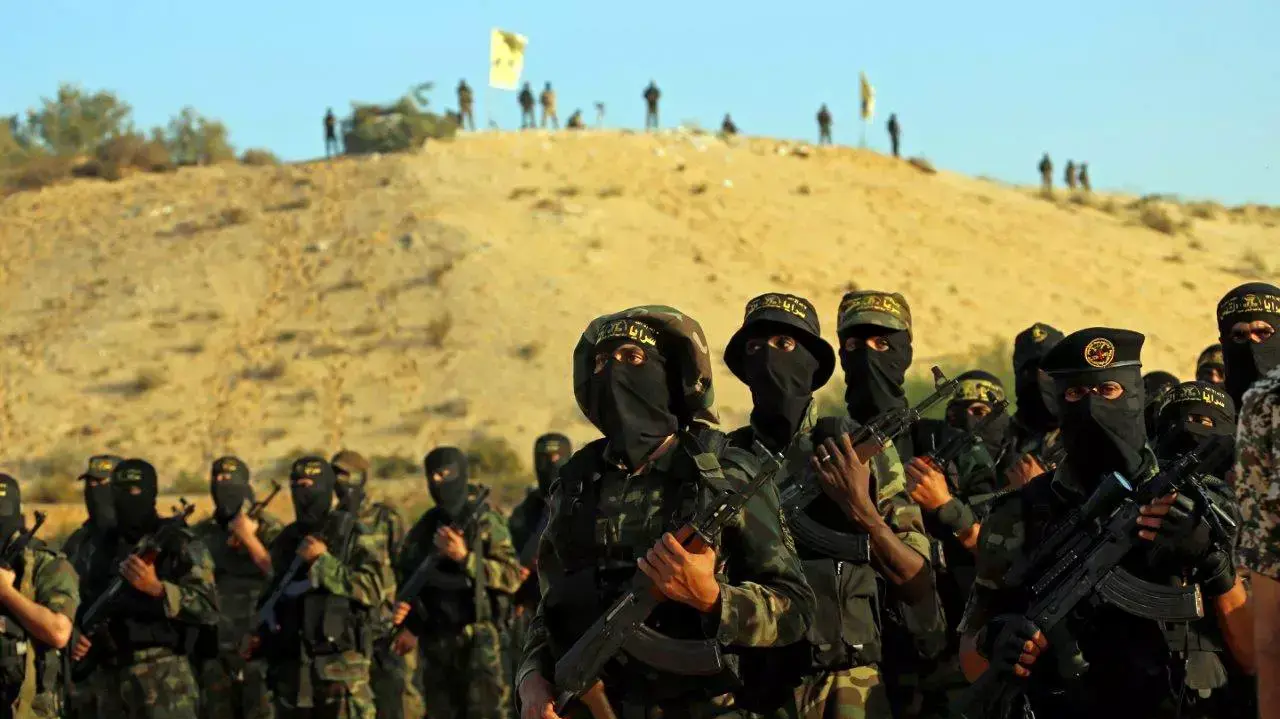 אנשי הג'יהאד האיסלאמי באימונים באזור דיר אל-בלח שבמרכז רצועת עזה, דצמבר 2014 אנשי הג'יהאד האיסלאמי באימונים באזור דיר אל-בלח שבמרכז רצועת עזה, דצמבר 2014