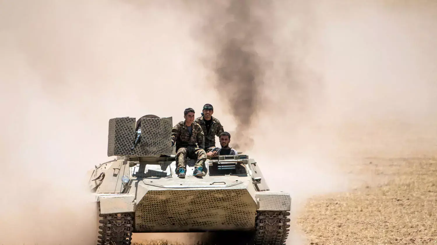 לוחמים המיליציה הכורדית YPG באזור העיירה תל אבייד, שבצפון סוריה, 14 ביוני 2015