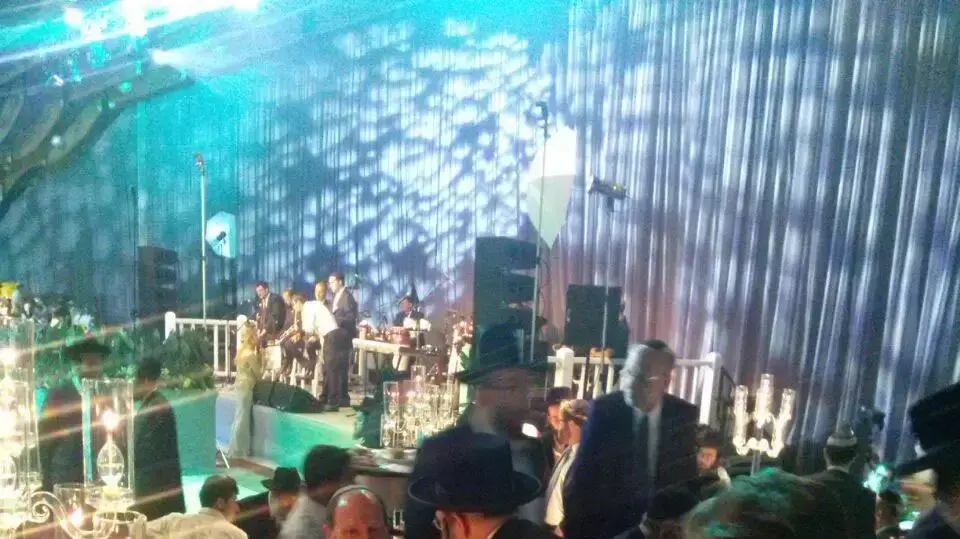 מרטין שלאף ודב וייסגלס בחתונת בת אחיו של שלאף, במלון הילטון בתל-אביב, 23 ביוני 2015