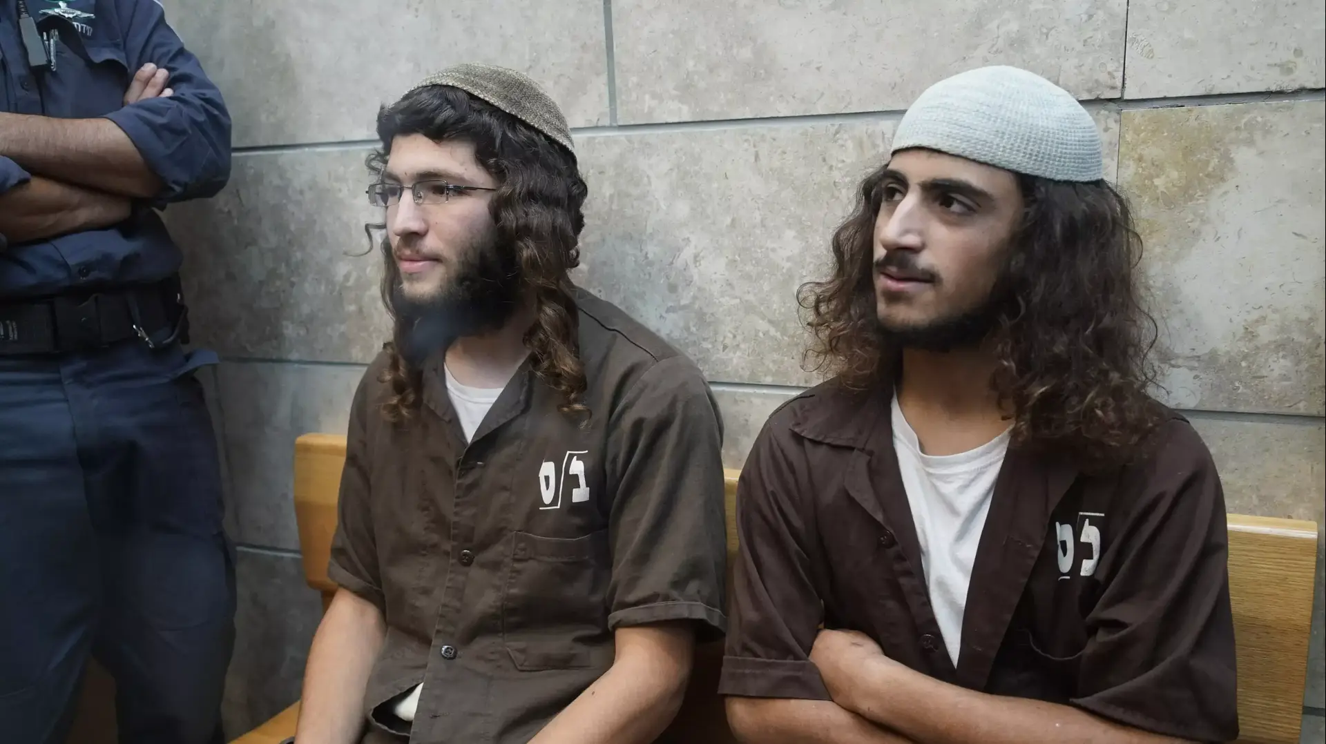 ינון ראובני ויהודה אסרף אלעד נאשמים בהצתה של כנסיית הלחם והדגים סמוך לכנרת, יולי 2015 ינון ראובני ויהודה אסרף אלעד נאשמים בהצתה של כנסיית הלחם והדגים סמוך לכנרת, יולי 2015