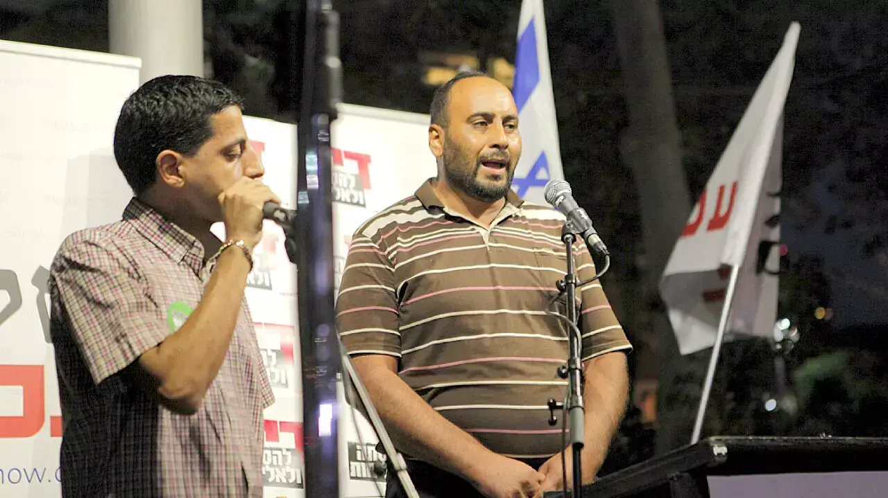 נאסר דוואבשה, דוד הפעוט שנרצח בהצתה בכפר דומא , מחאת "דיי לאלימות, דיי להסתה", כיכר רבין, תל אביב, אוגוסט 2015
