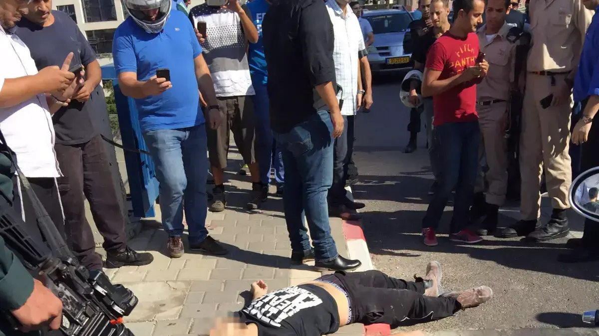 המחבל בזירת הפיגוע בתל אביב המחבל בזירת הפיגוע בתל אביב