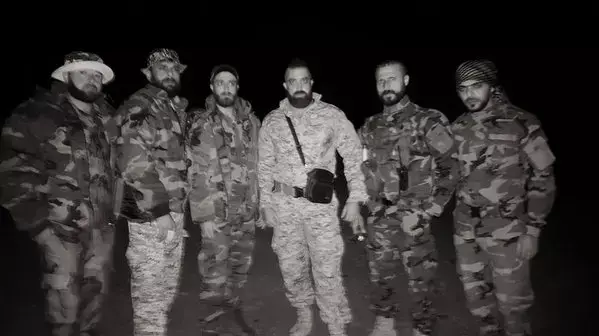 לוחמים בג'יהאד האיסלאמי בסוריה לוחמים בג'יהאד האיסלאמי בסוריה