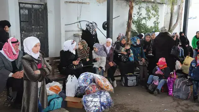 תושבי דרום דמשק שבים לבתיהם, 20 בינואר 2016 תושבי דרום דמשק שבים לבתיהם, 20 בינואר 2016