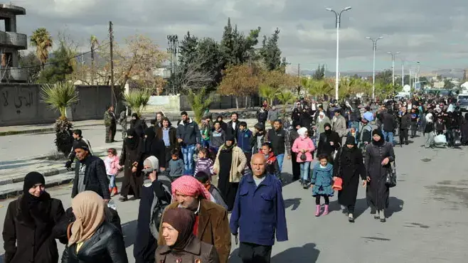 תושבי דרום דמשק שבים לבתיהם, 20 בינואר 2016 תושבי דרום דמשק שבים לבתיהם, 20 בינואר 2016