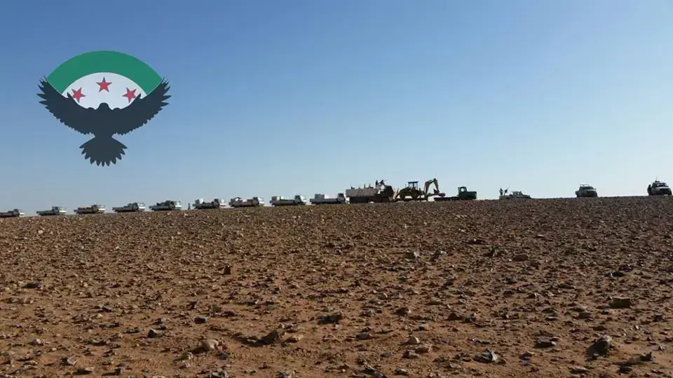 שיירה של הארגון "צבא סוריה החדש" באזור הגבול עם עיראק, בדרכה לעיירה אל-בוכמאל, 29 ביוני 2016