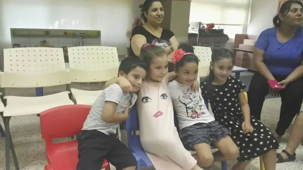 ילדים חוגגים במרכז לגיל הרך שנפגע מרקטה ביום שישי, שדרות. 3 ביולי 2016 ילדים חוגגים במרכז לגיל הרך שנפגע מרקטה ביום שישי, שדרות. 3 ביולי 2016