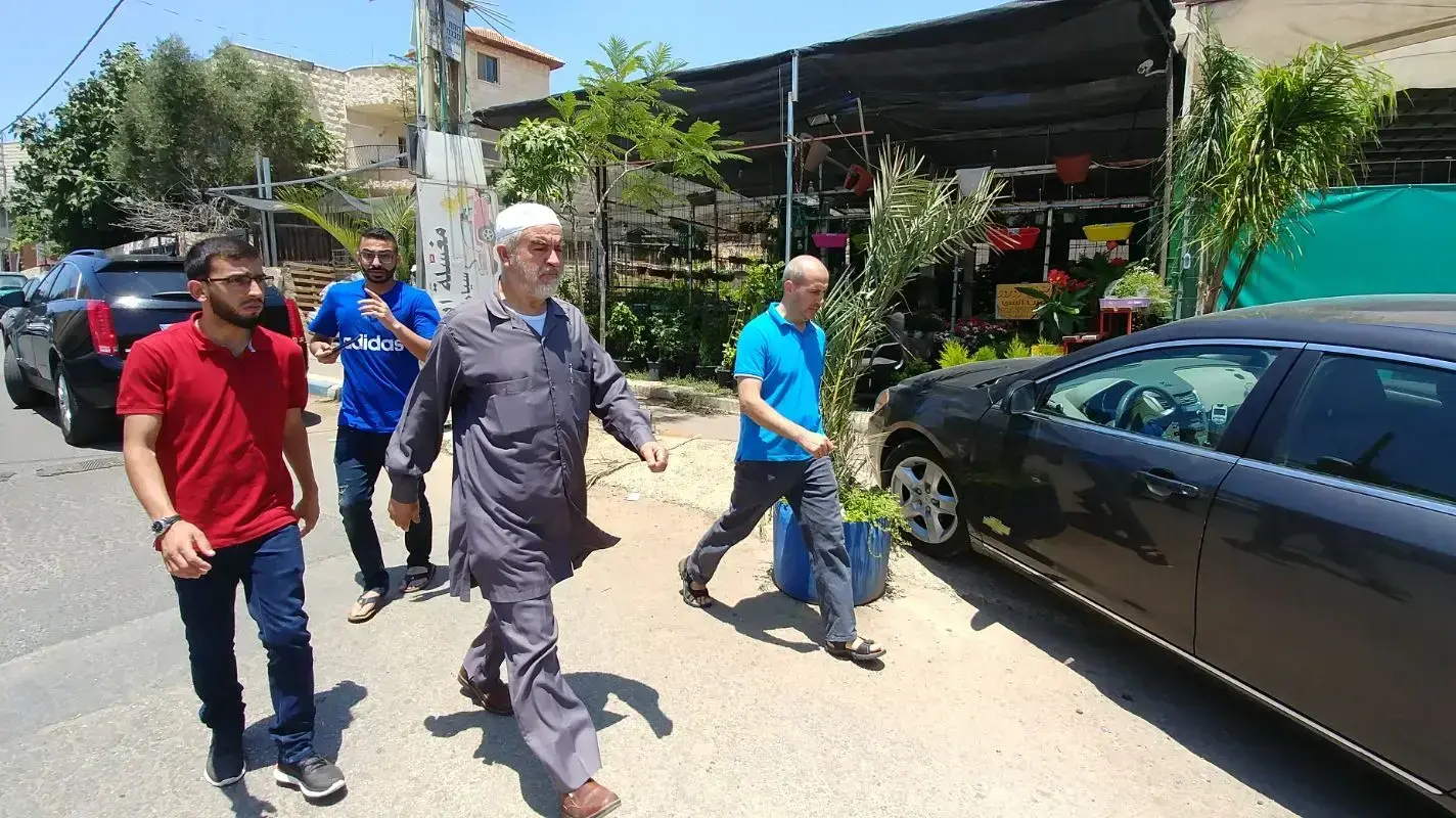 מנהיג הפלג הצפוני ראאד סלאח יוצא מבית אחד המחבלים באום אל-פחם, 14 ביולי 2017 מנהיג הפלג הצפוני ראאד סלאח יוצא מבית אחד המחבלים באום אל-פחם, 14 ביולי 2017