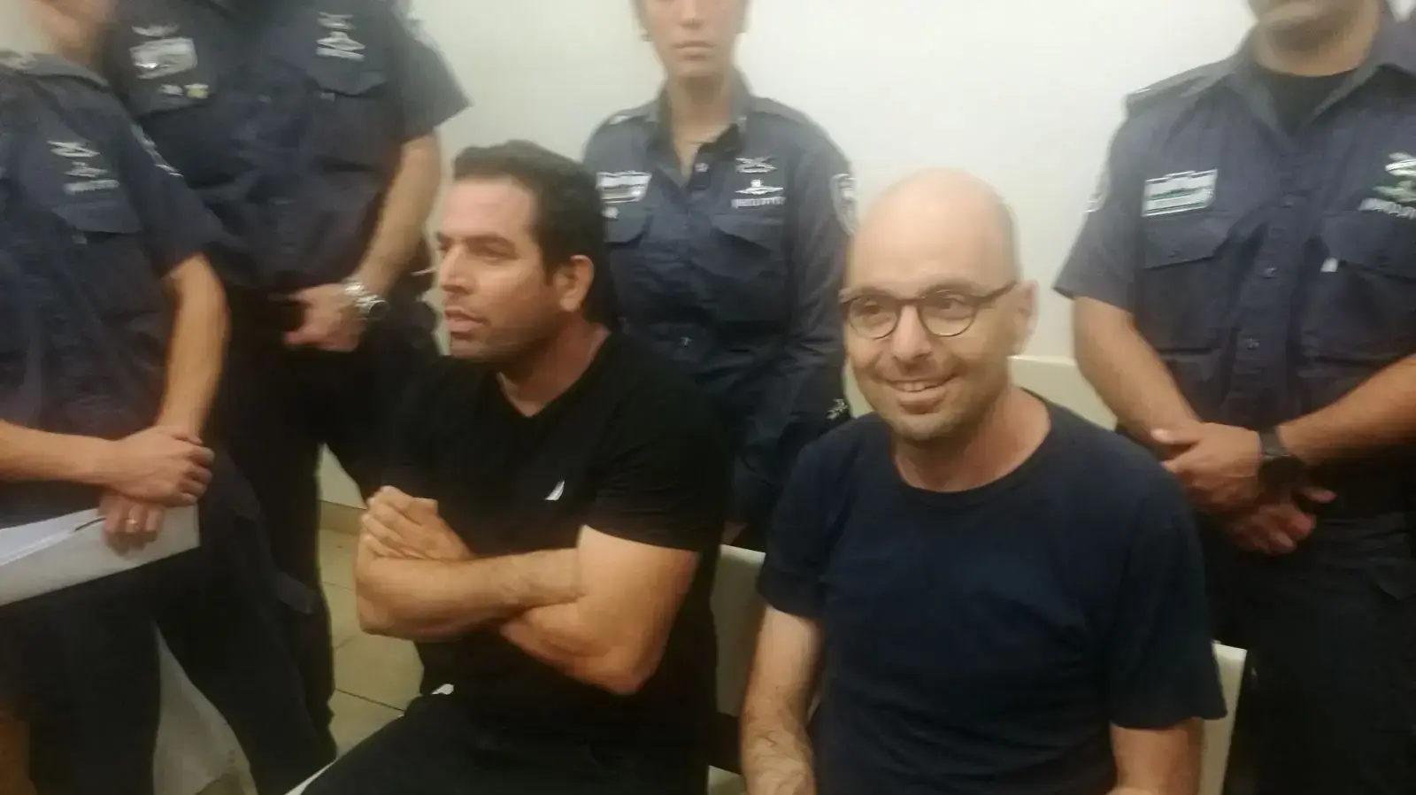 מני נפתלי ואלדד יניב בדיון על הארכת מעצרם בפתח תקווה 20 באוגוסט 2017 מני נפתלי ואלדד יניב בדיון על הארכת מעצרם בפתח תקווה 20 באוגוסט 2017