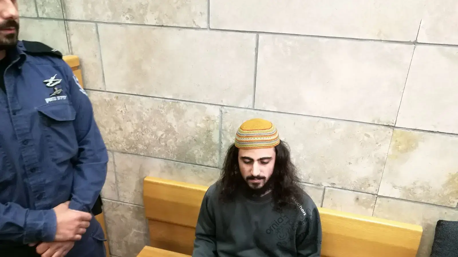 ינון ראובני שהורשע בהצתת כנסית הלחם והדגים , בעת הקראת גזר דינו, 12 בדצמבר 2017 ינון ראובני שהורשע בהצתת כנסית הלחם והדגים , בעת הקראת גזר דינו, 12 בדצמבר 2017