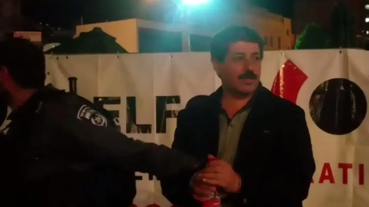 ג'עפר פרח מנכ"ל עמותת מוסאווא במהלך ההפגנה בחיפה - 18 במאי 2018
