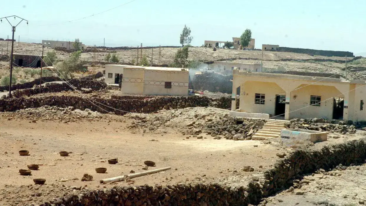 בתים באזור לאחה שבמחוז דרעה הצפוני-מזרחי, בסוריה ב -25 ביוני 2018
בתים באזור לאחה שבמחוז דרעה הצפוני-מזרחי, בסוריה ב -25 ביוני 2018