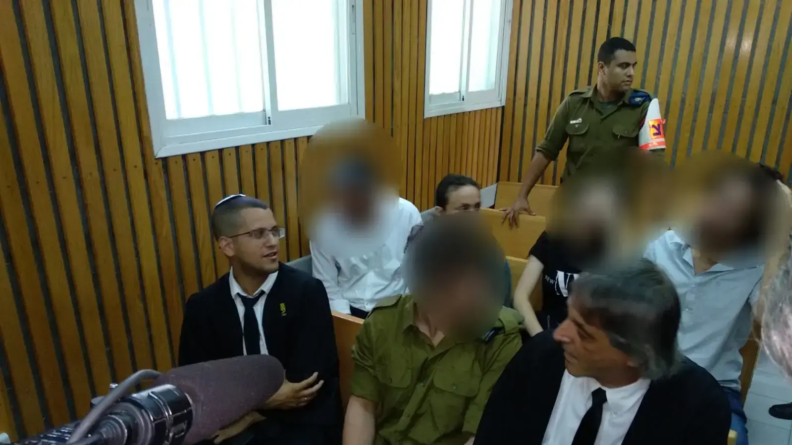 נ' מלווה בעורכי דינו לקראת גזר דינו בבית המשפט הצבאי, יפו
נ' מלווה בעורכי דינו לקראת גזר דינו בבית המשפט הצבאי, יפו