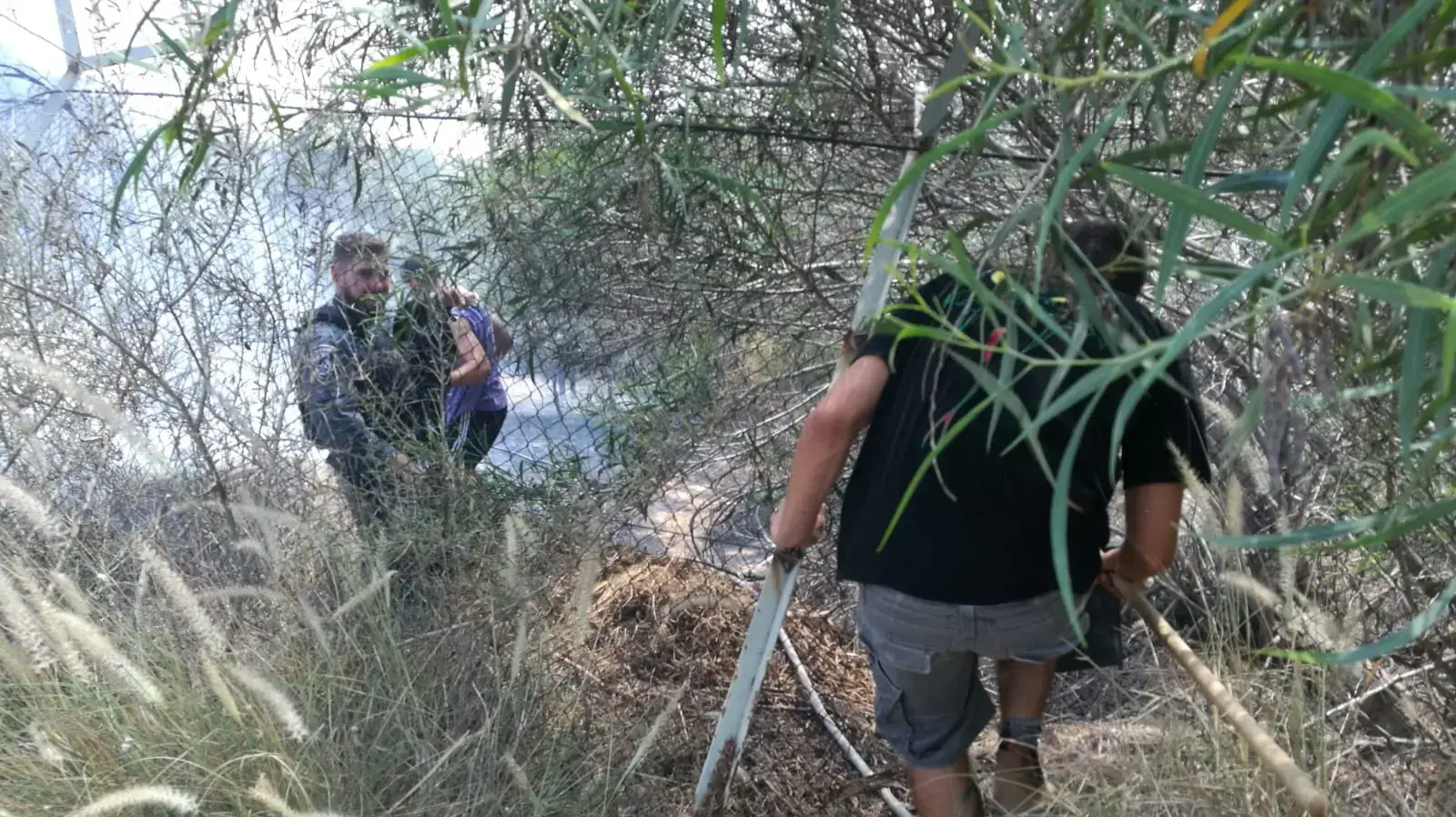 פעולות לאיתור נפלי רקטות ושריפות באזור מושב נתיב העשרה, 14 ביולי 2018 פעולות לאיתור נפלי רקטות ושריפות באזור מושב נתיב העשרה, 14 ביולי 2018