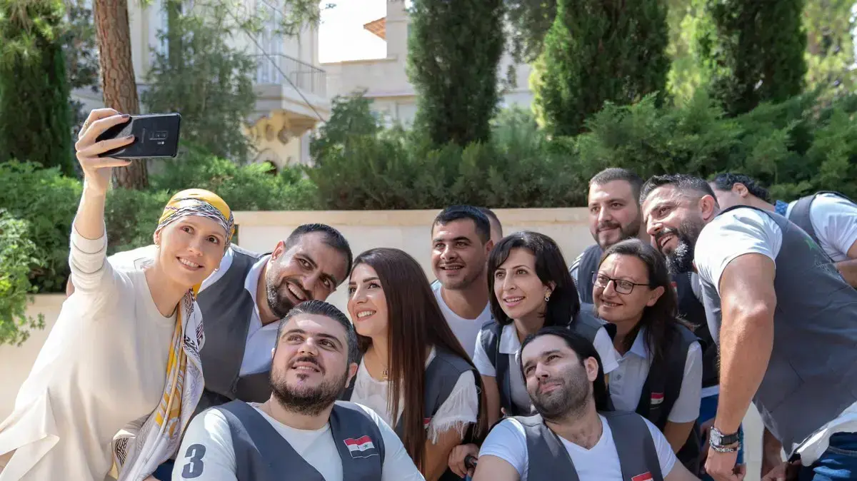 אסמה אסד עם פצועי מלחמה סורים אסמה אסד עם פצועי מלחמה סורים