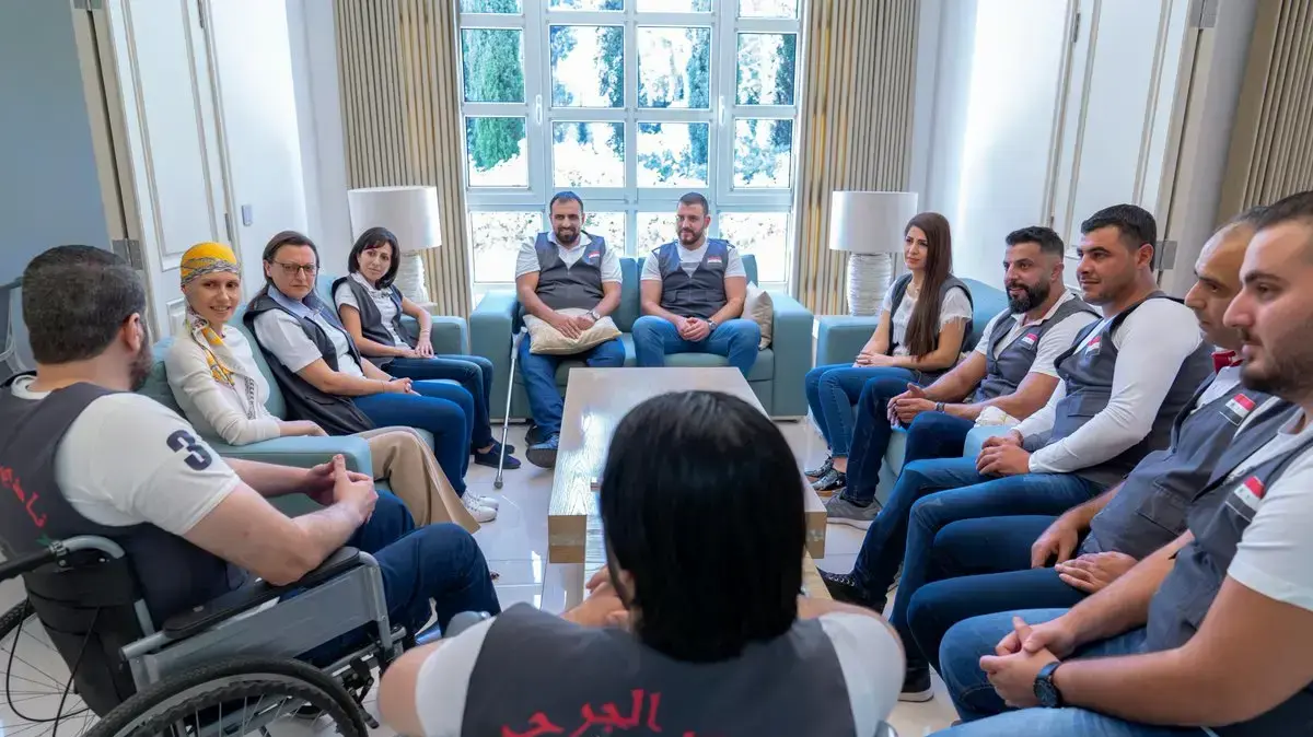 אסמה אסד עם פצועי מלחמה סורים אסמה אסד עם פצועי מלחמה סורים