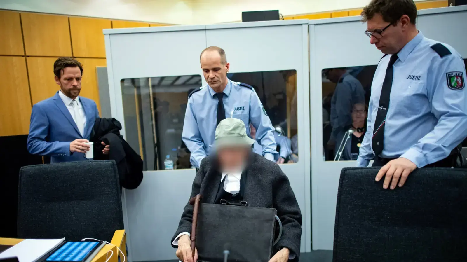 יוהן ר', שומר נאצי לשעבר בבית משפט בעיר מיניסטר, גרמניה, 6 בנובמבר 2018 יוהן ר', שומר נאצי לשעבר בבית משפט בעיר מיניסטר, גרמניה, 6 בנובמבר 2018
