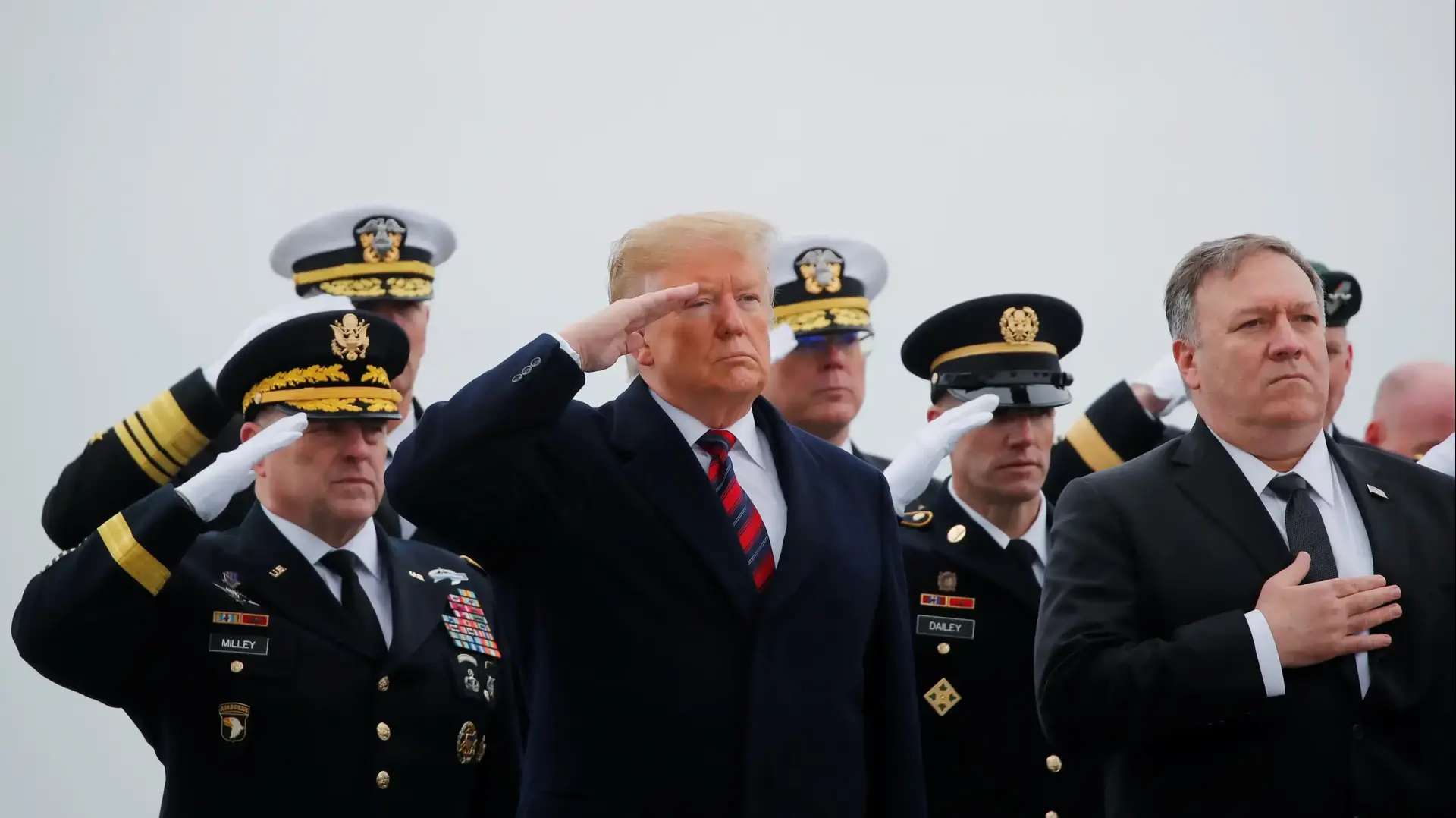 טראמפ 

Chief of Staff of the U.S. Army Mark Milley, President Donald Trump, Sgt. Maj. of the Army Daniel Dailey and Secretary of State Mike Pompeo salute as a military honor guard carries the casket of Scott Wirtz, a civilian employee of the U.S. Defense Intelligence Agency killed along with three members of the U.S. military during a recent attack in Syria, past them during a dignified transfer ceremony at Dover Air Force Base, in Dover, Delaware, U.S., January 19, 2019