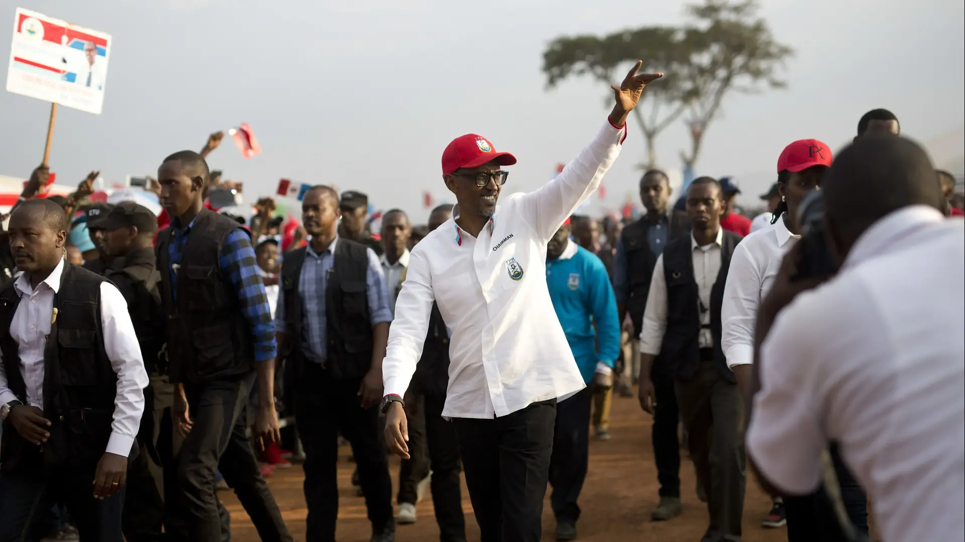 Rwanda's President Paul Kagame wave as he leaves an election campaign rally on the hills overlooking Kigali, Rwanda, Wednesday Aug. 2, 2017. Kagame has been in power since the end of the country's genocide in 1994 and is widely expected to win another term in the Aug. 4 elections after the government earlier this month disqualified all but three candidates. (AP Photo/Jerome Delay)
Rwanda's President Paul Kagame wave as he leaves an election campaign rally on the hills overlooking Kigali, Rwanda, Wednesday Aug. 2, 2017. Kagame has been in power since the end of the country's genocide in 1994 and is widely expected to win another term in the Aug. 4 elections after the government earlier this month disqualified all but three candidates. (AP Photo/Jerome Delay)
