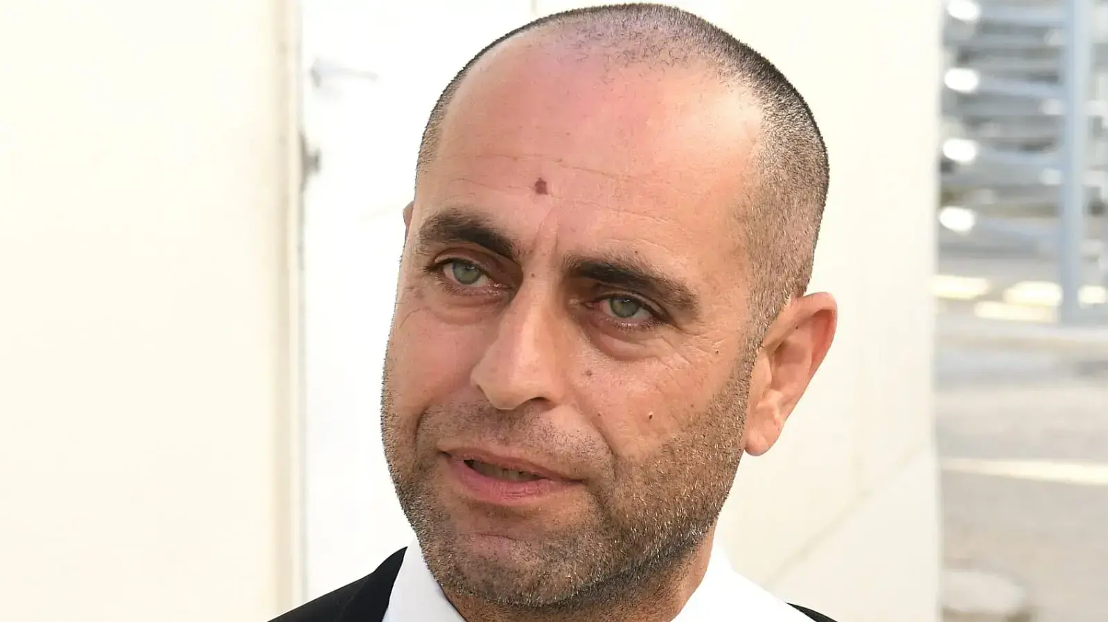 עו"ד של החשוד באונס בת ה- 7 מחמוד קטוסה מחוץ לבית המשפט הצבאי בעופ 19 ביוני 2019 עו"ד של החשוד באונס בת ה- 7 מחמוד קטוסה מחוץ לבית המשפט הצבאי בעופ 19 ביוני 2019