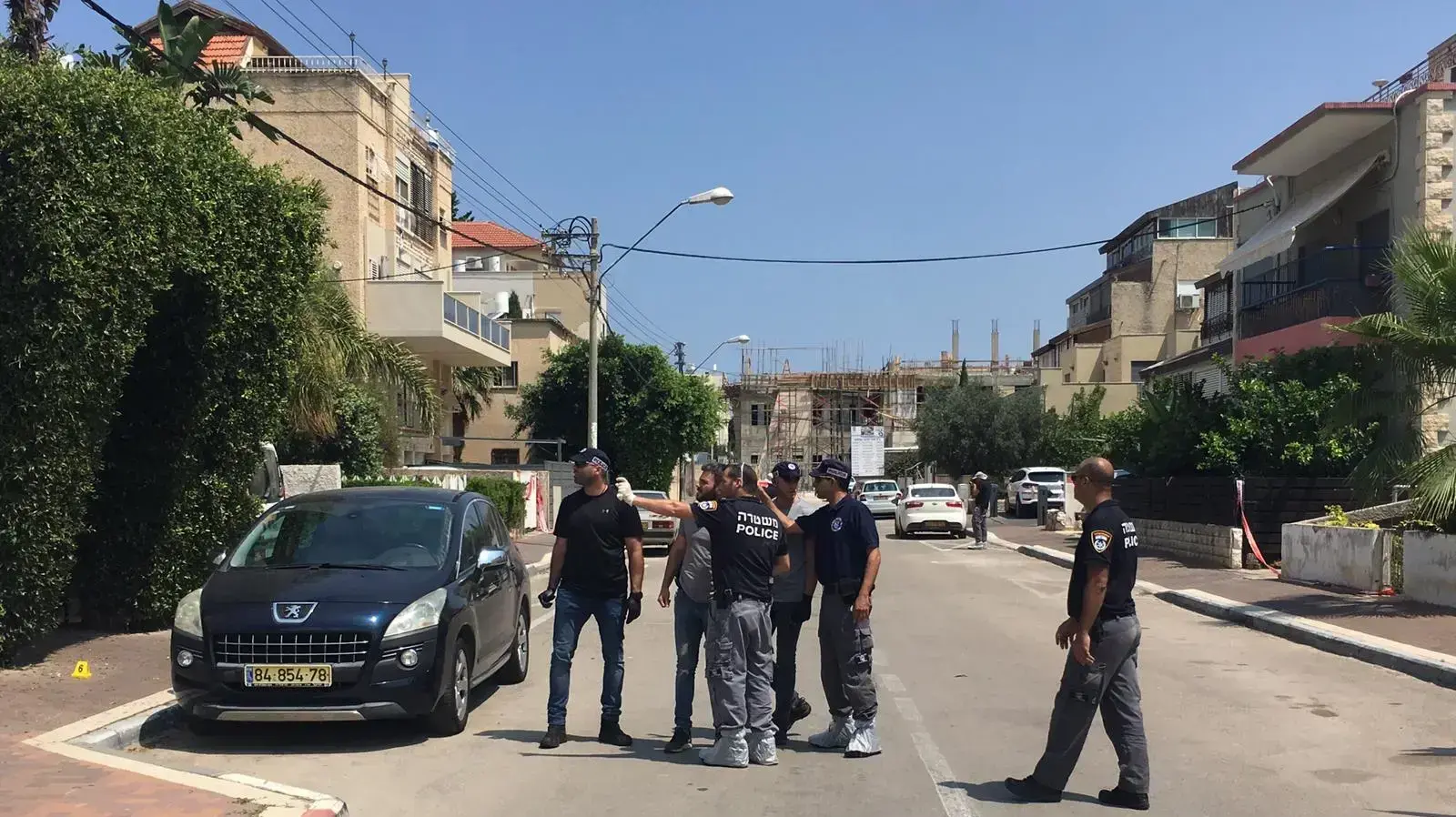זירת הרצח ברחוב אושה בקרית מוצקין, 30 ביוני 2019 זירת הרצח ברחוב אושה בקרית מוצקין, 30 ביוני 2019